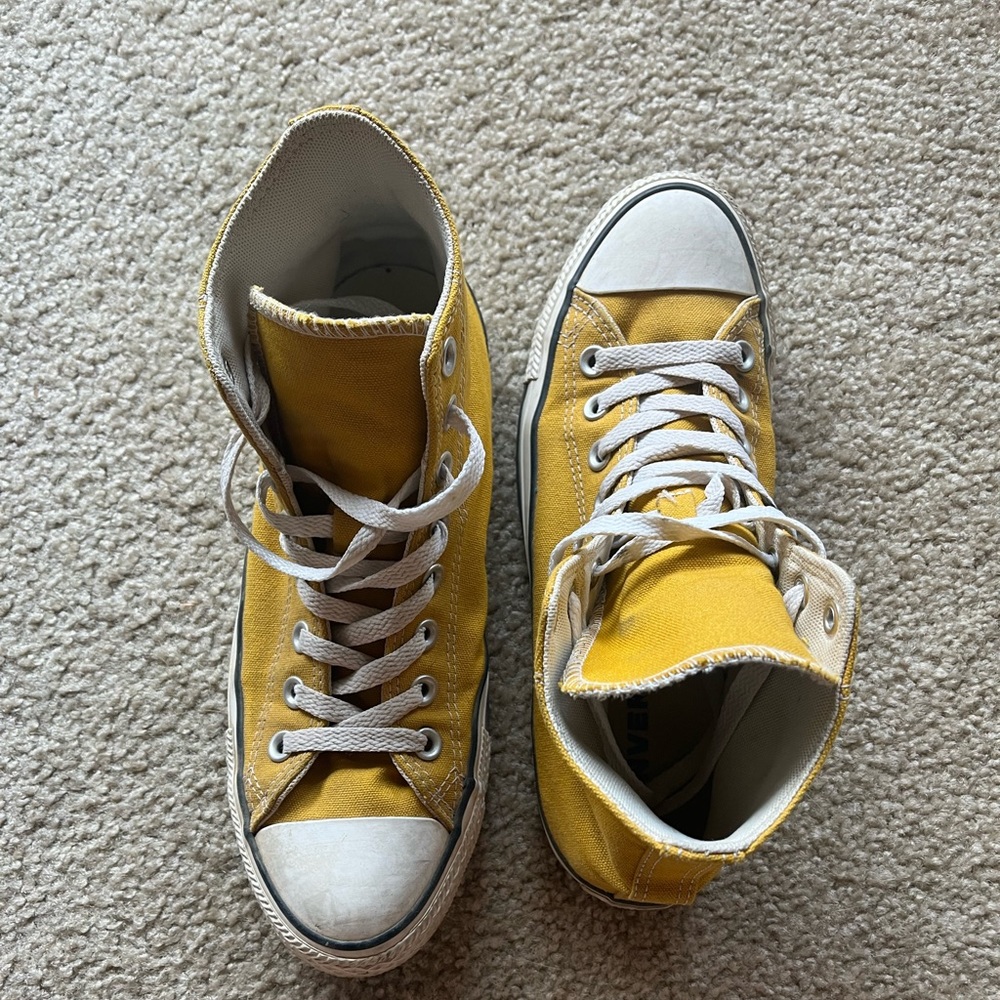 Yellow high top converse